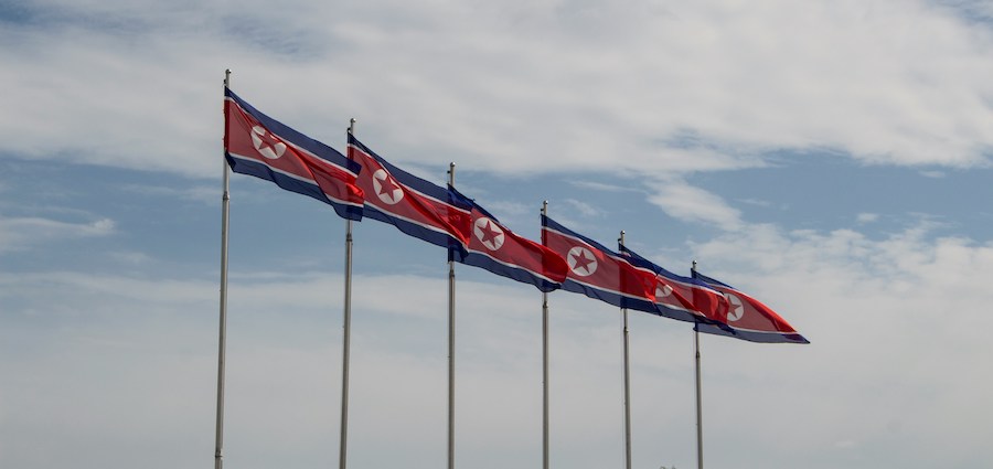 North Korean flags Unsplash Micha Brändli