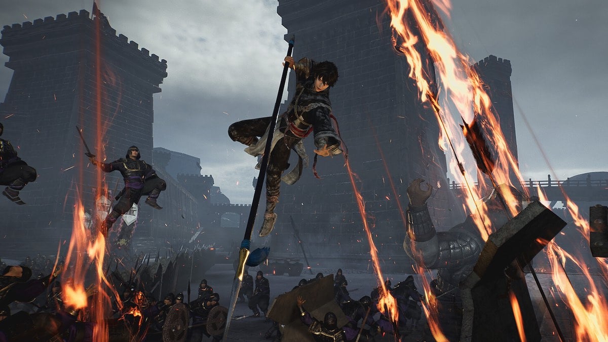 The main character leaps into the air to attack from above with his spear. flaming arrows also rain down on the enemy 