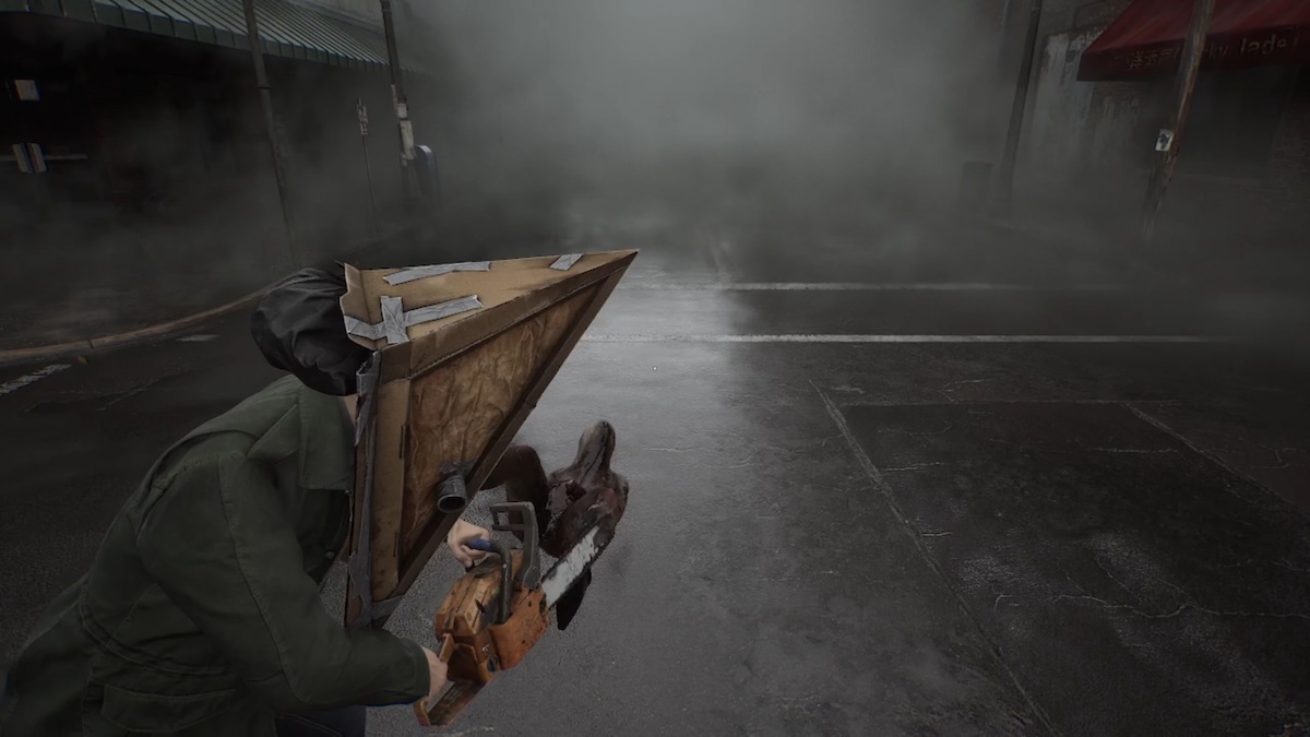 Silent Hill 2 remake James using the chainsaw