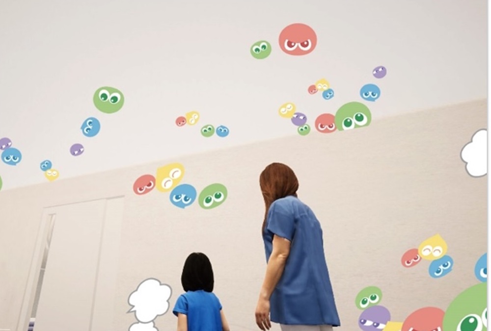 The Jikei University Hospital concept art of Puyo Puyo designs on corridor walls