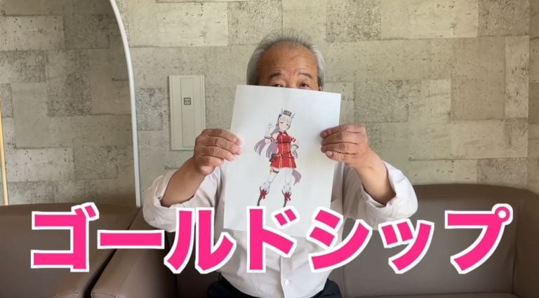 Matchan holding a picture of Goldship