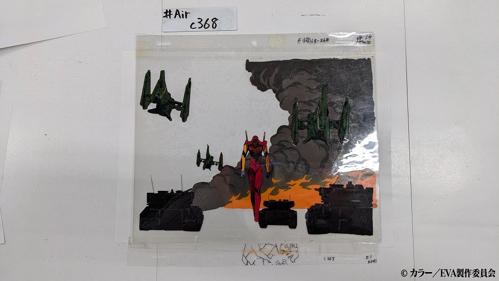 Evangelion cel with Crayon Shin-chan drawings underneath.