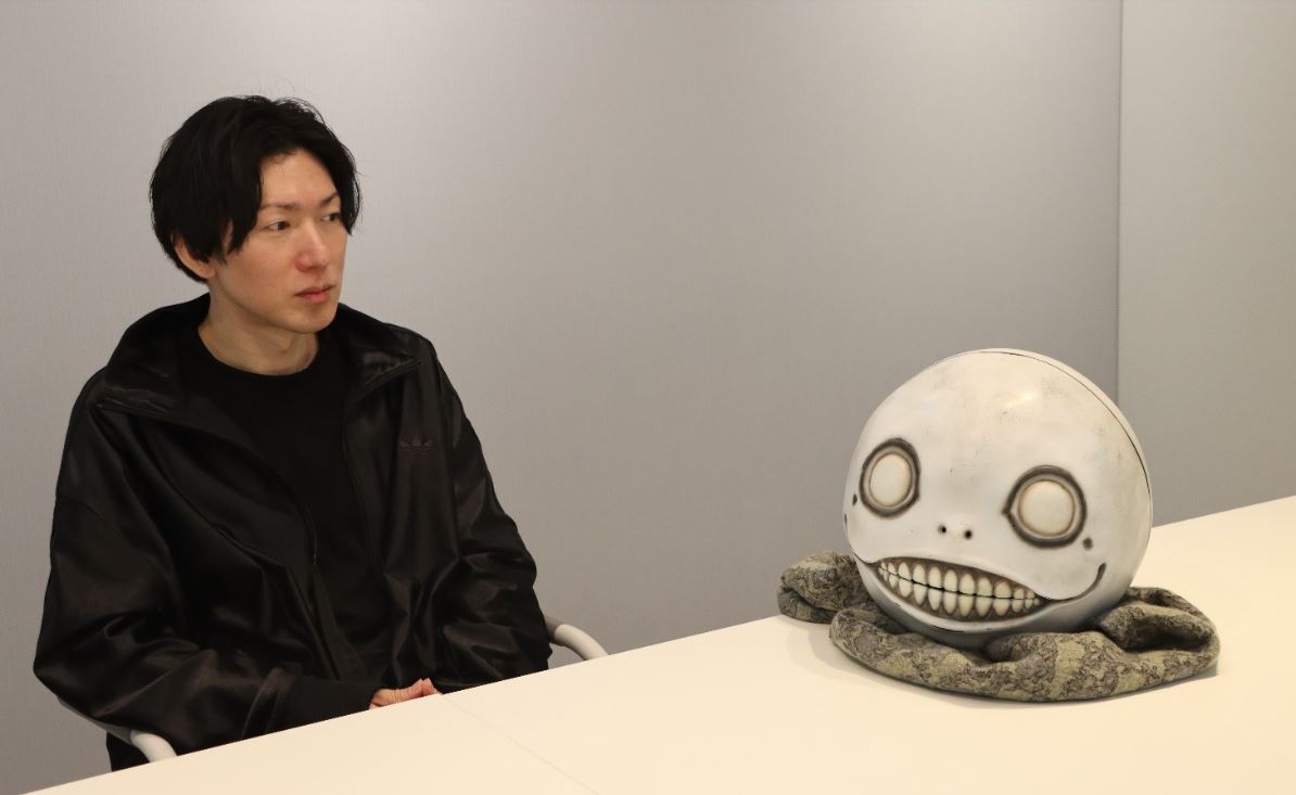 Taura Takahisa and Yoko Taro mask